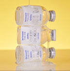 DERMALINE D’LEXO Milk Exosome Solution Ampoule 35ml bottle and applicator