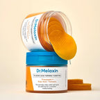 Dr.Melaxin TX Kojic Acid Turmeric Toner Pad jar with two textured toner pads