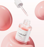 medicube PDRN Pink Peptide Serum 30 ml bottle with pink serum droplets