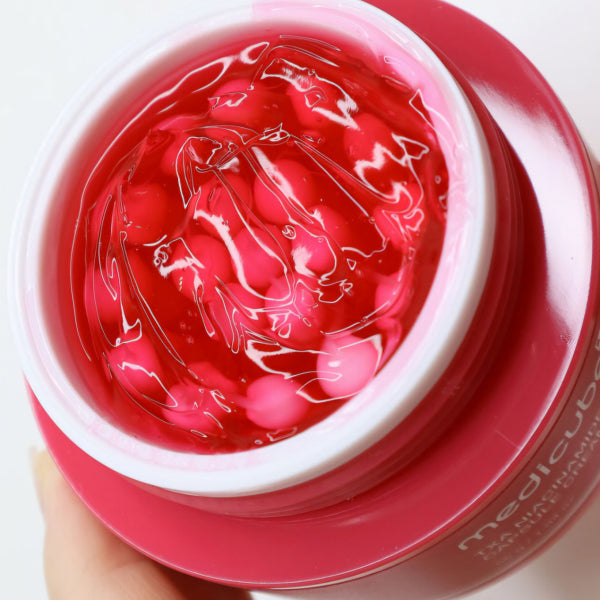 medicube TXA Niacinamide Capsule Cream 55 g jar with red capsules and gel