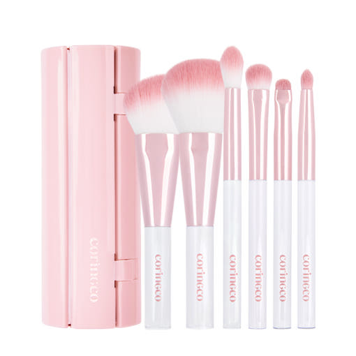 CORINGCO Pink Roll Brush Set 6P with six pink makeup brushes in a roll-up case