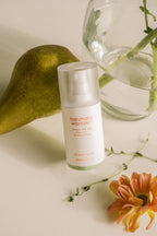 A bottle of haruharu wonder Centella 4% TXA serum for uneven skin tone on a white background