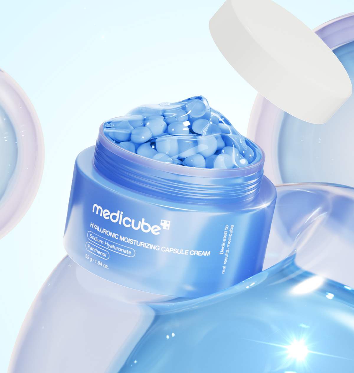medicube Hyaluronic Moisturizing Capsule Cream 55g jar with blue capsules and transparent gel