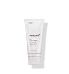Medicube Red Foam Cleanser 120 ml white tube displayed against a cushion of white foam