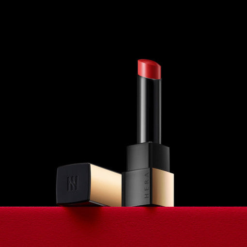 HERA Rouge Classy 301 Seoul Red lipstick in black and gold packaging