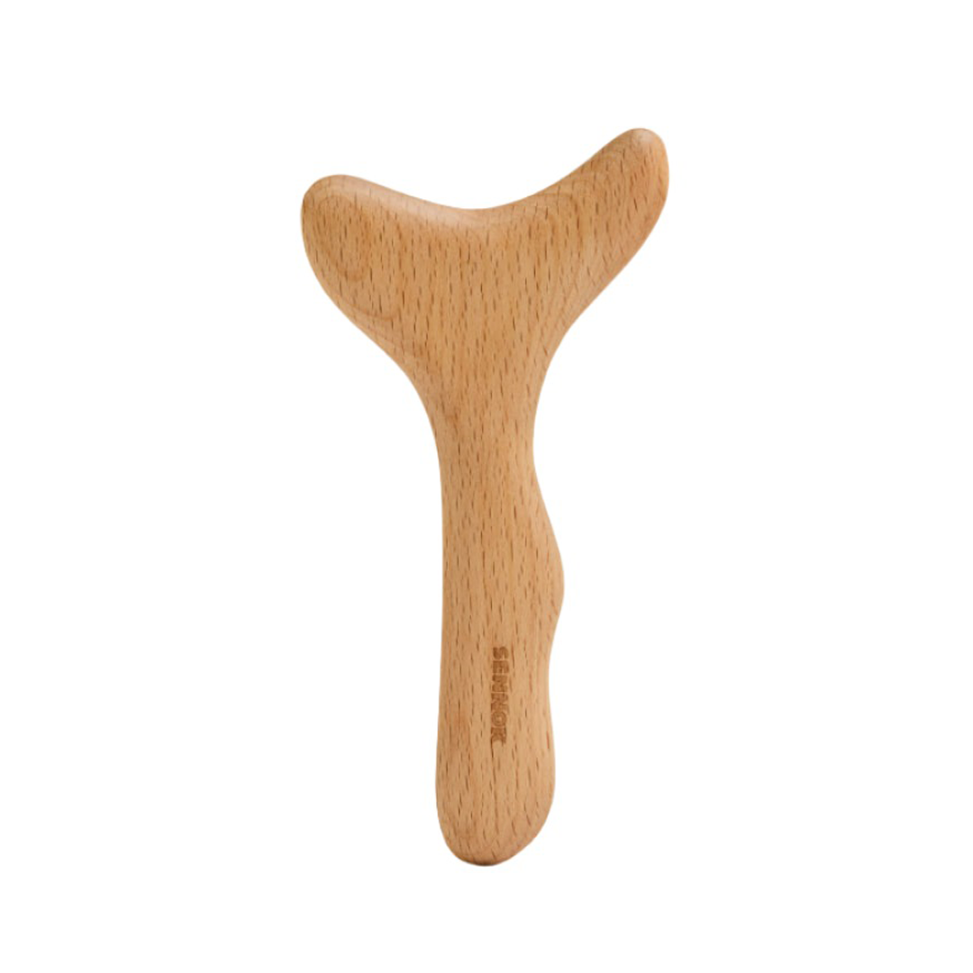 SENNOK Multi Bbul Guasha beechwood massage tool held in a hand